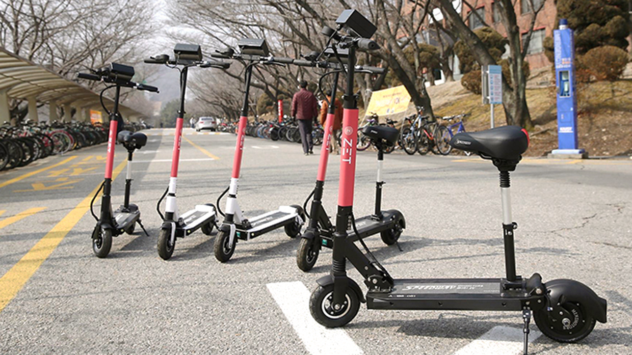 Image of several kickboards parked