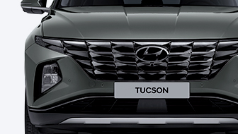 Daytime running lights integrated with radiator grille