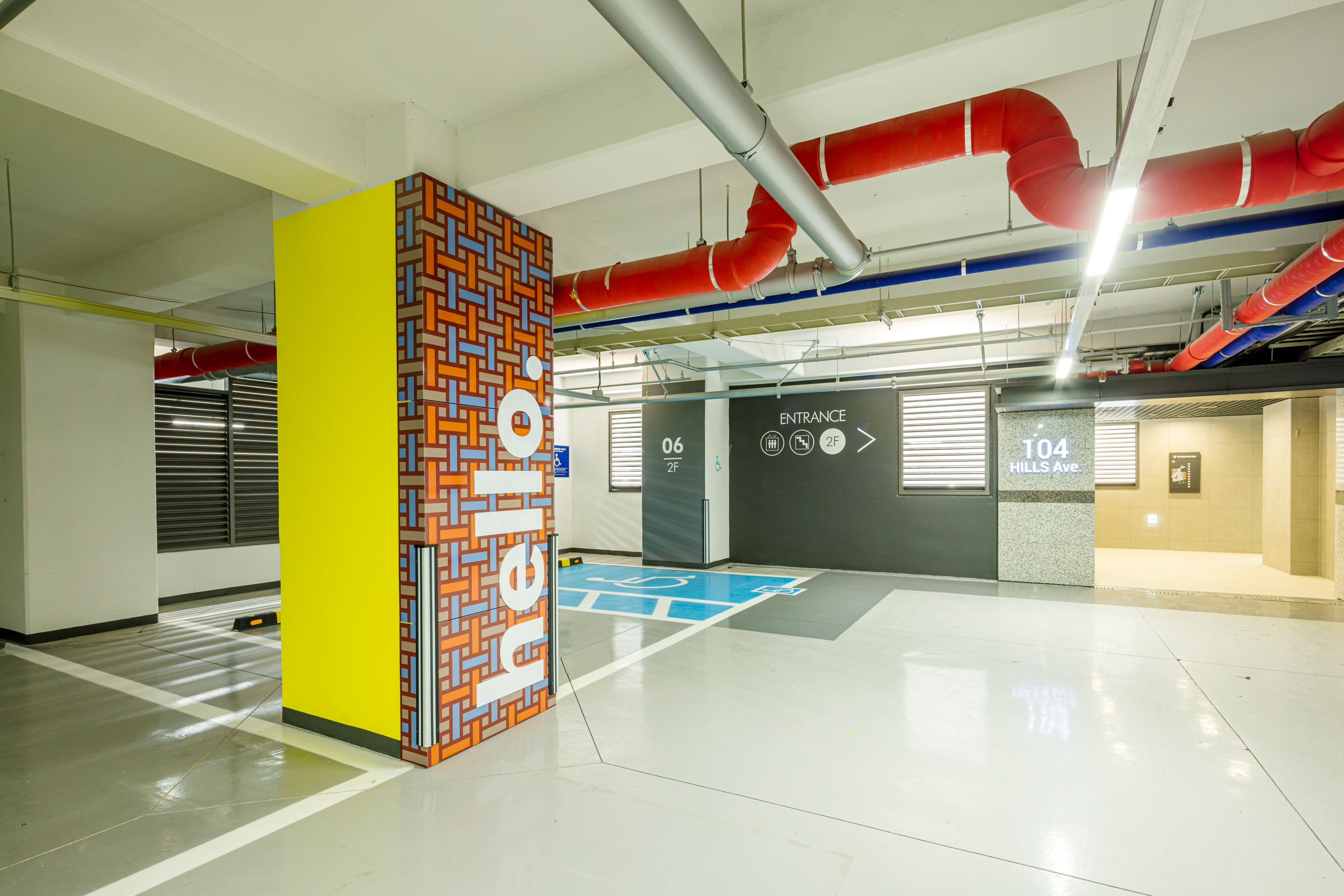 Photo taken from different angles of the entrance pillar painted in Gen Z Style pattern with a Hello sign