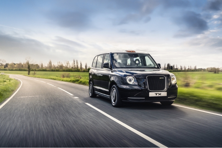 The latest model of a British black cab on its way