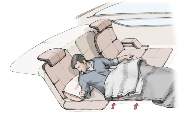 A man is trying to lie down on a sheet covered with a safety blanket