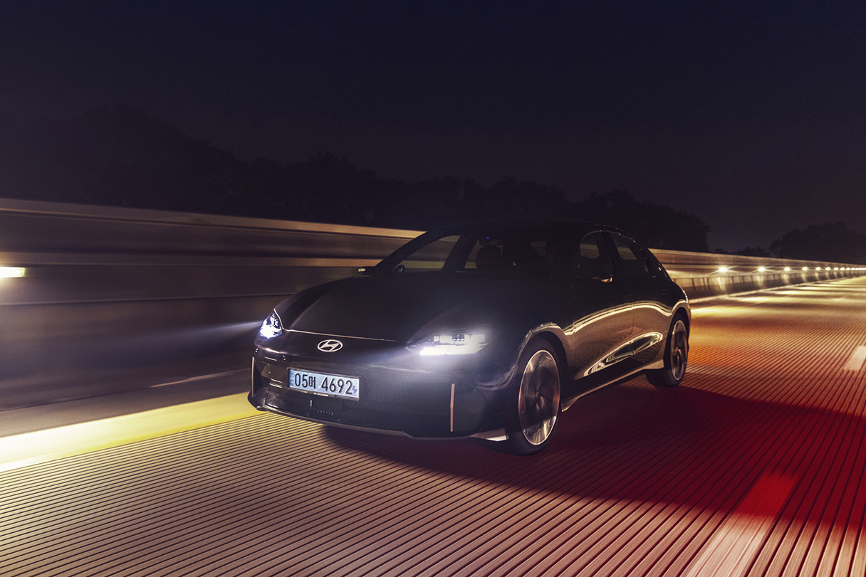 IONIQ 6 in motion on a dark road