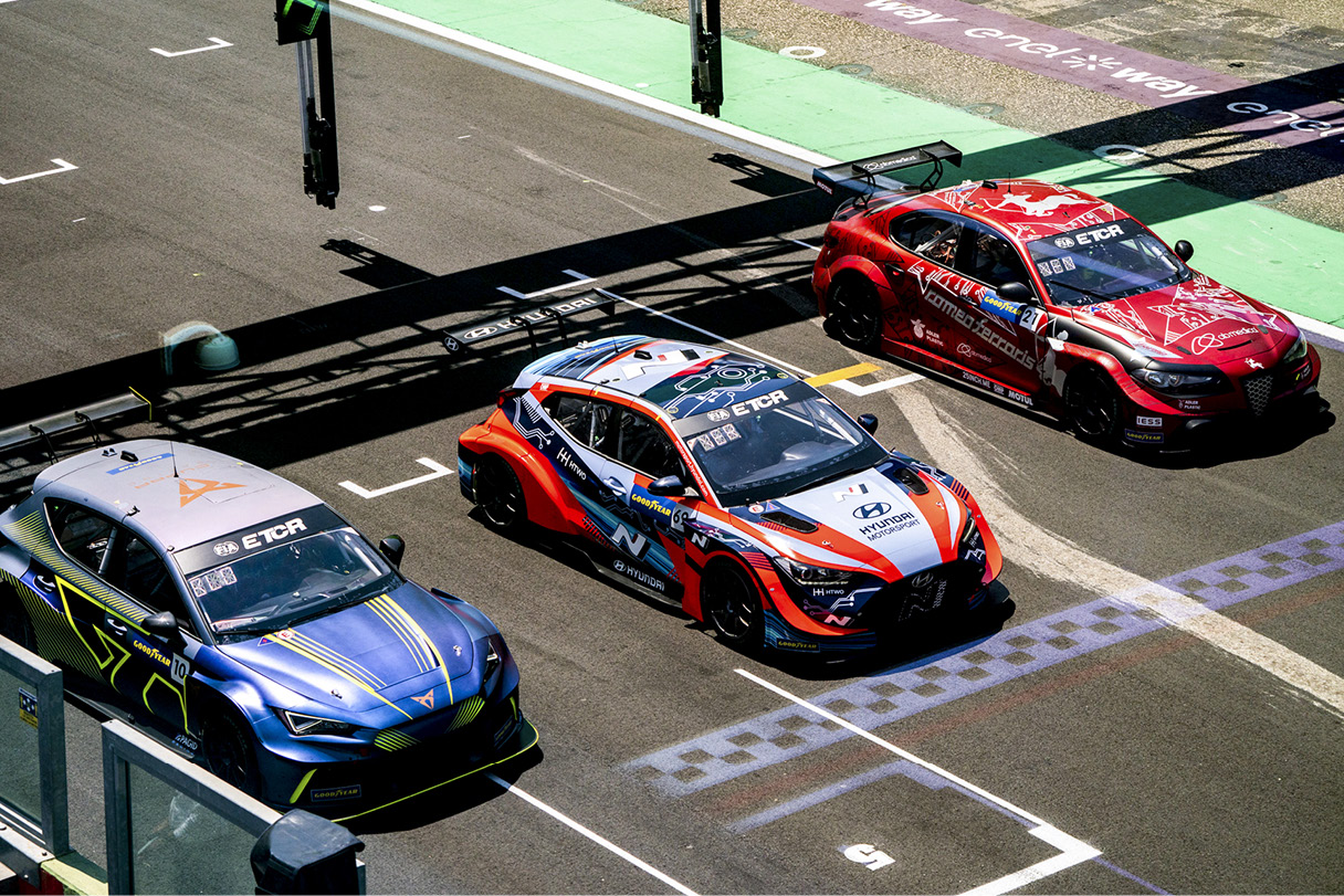 A Veloster racing car starting off the grid