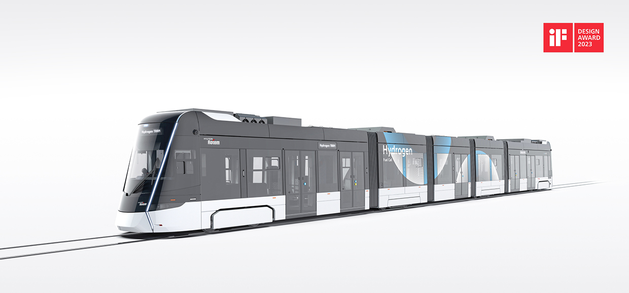 The red logo of the ‘2023 iF Design Award’ is in the upper right corner of the side of the hydrogen-powered tram being developed by Hyundai Rotem.