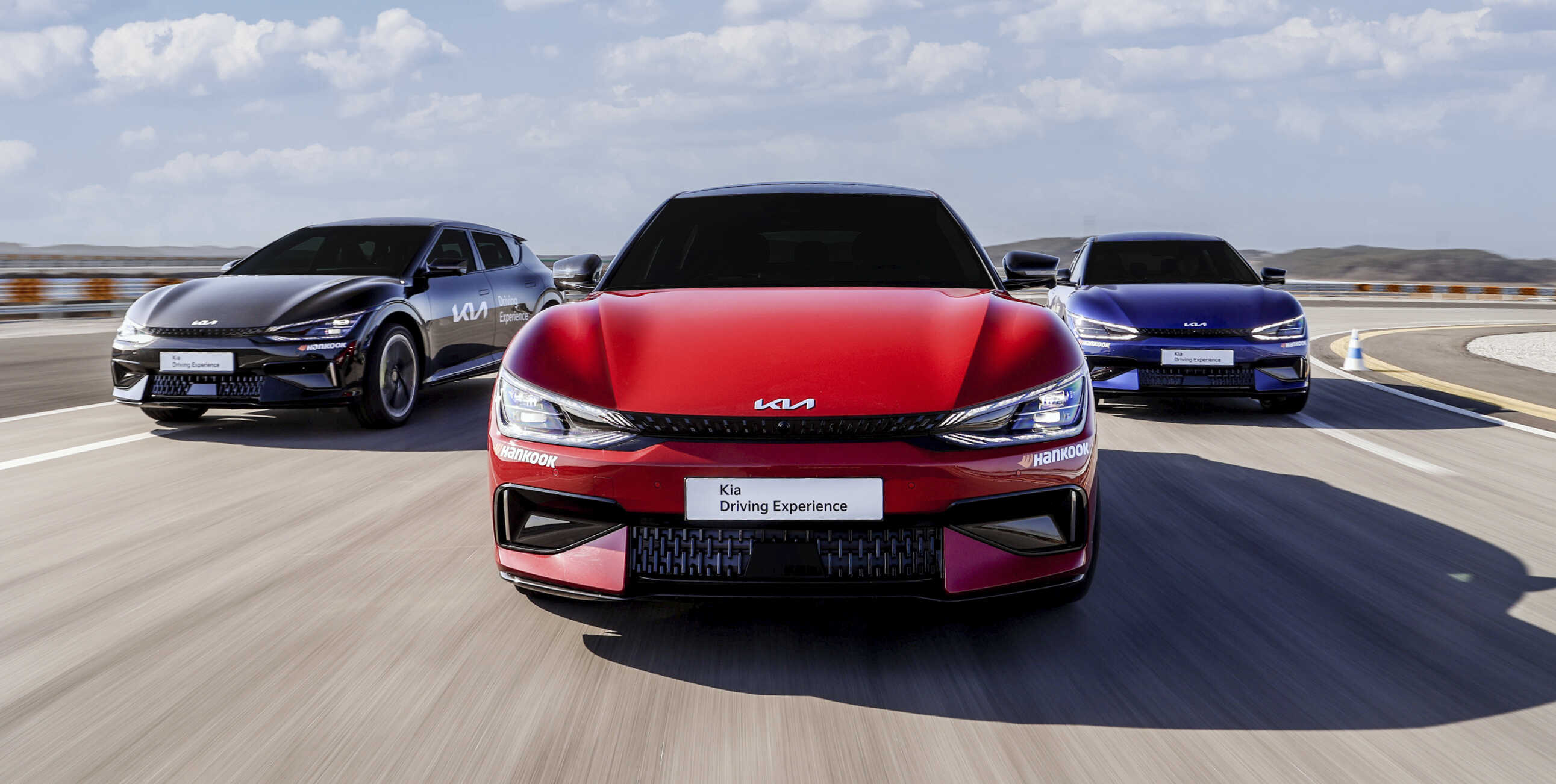 Three Kia EV6 GTs driving the circuit