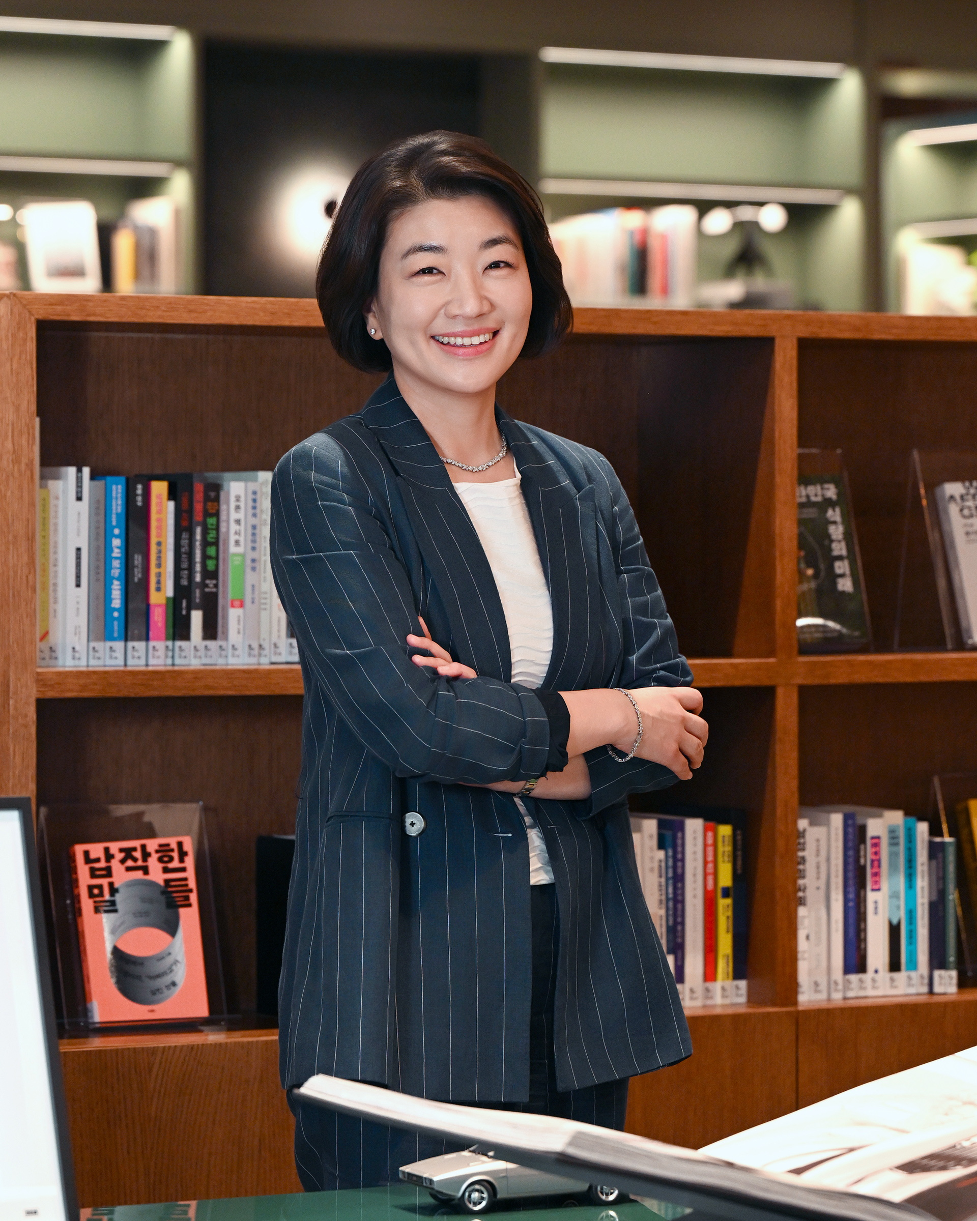 Hae In Kim, HMG CHRO at Hyundai Motor Group, in an interview in a library setting