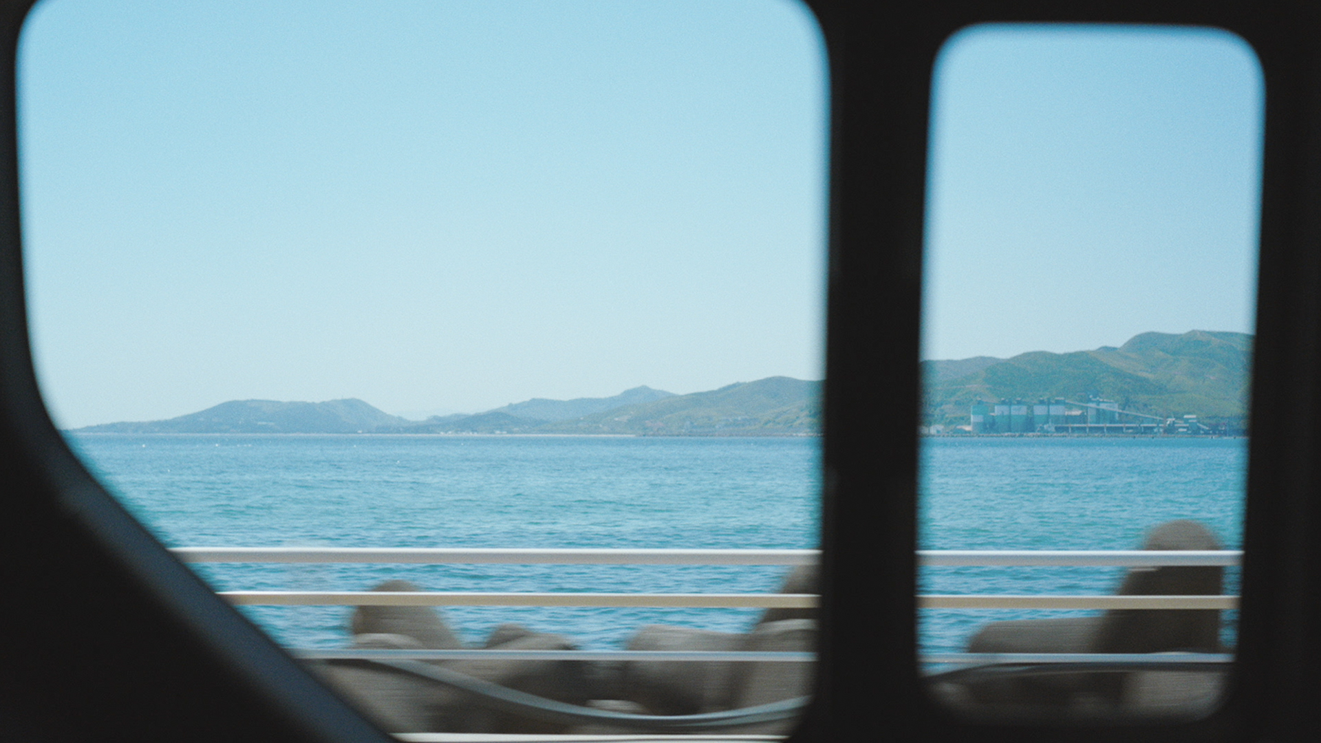 Looking out at the sea through the vehicle window