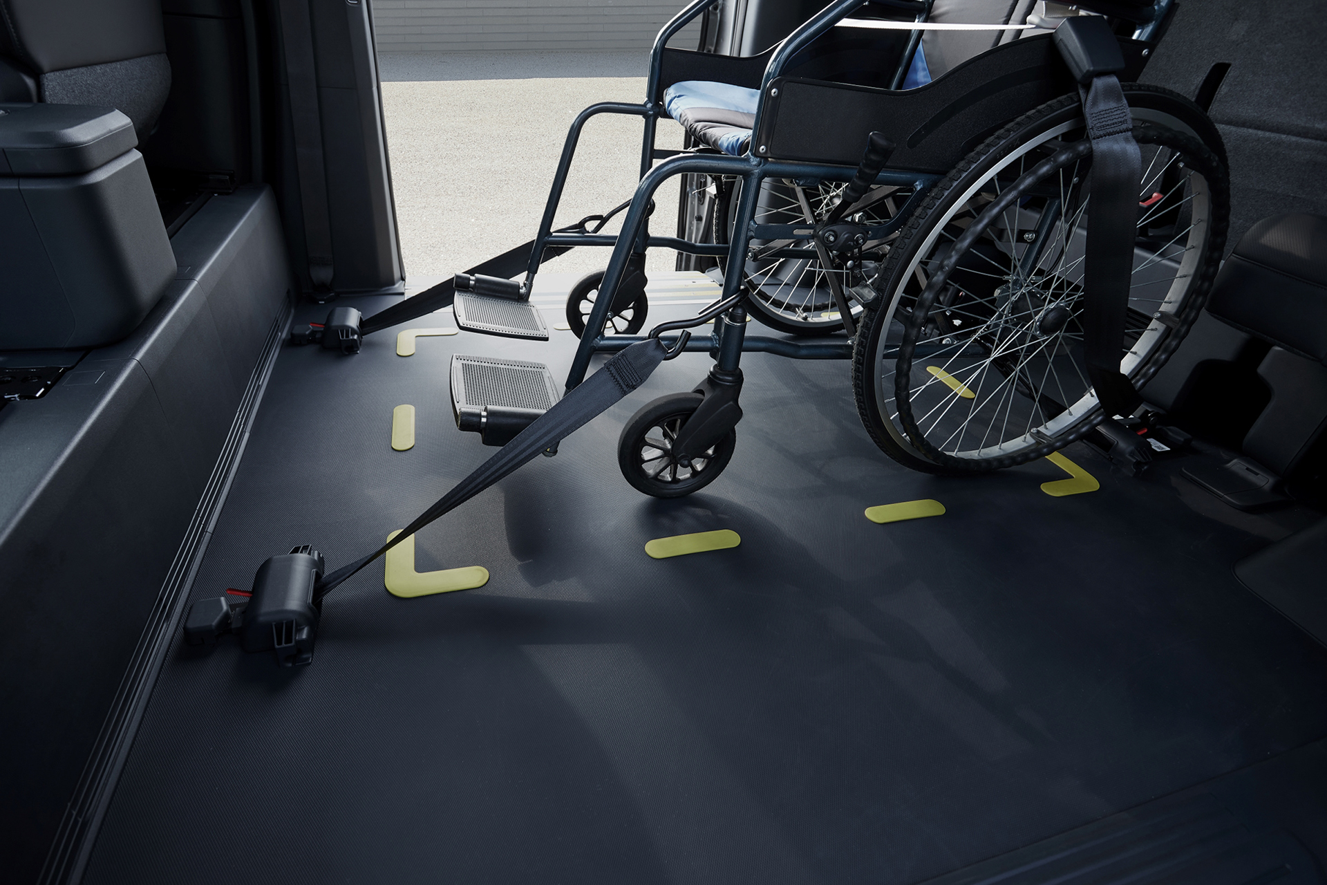 Wheelchair securement system inside the Kia PV5 WAV