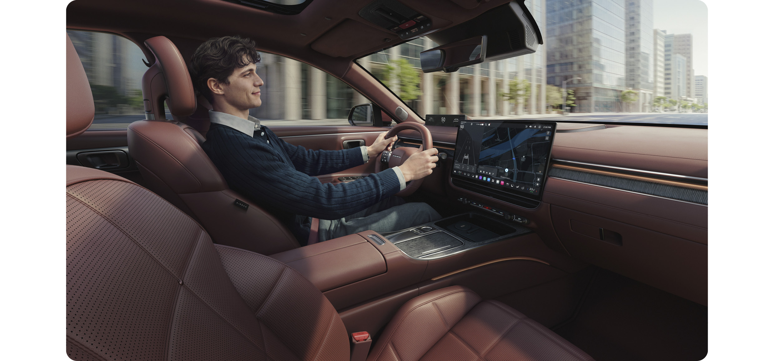 A man is driving a car