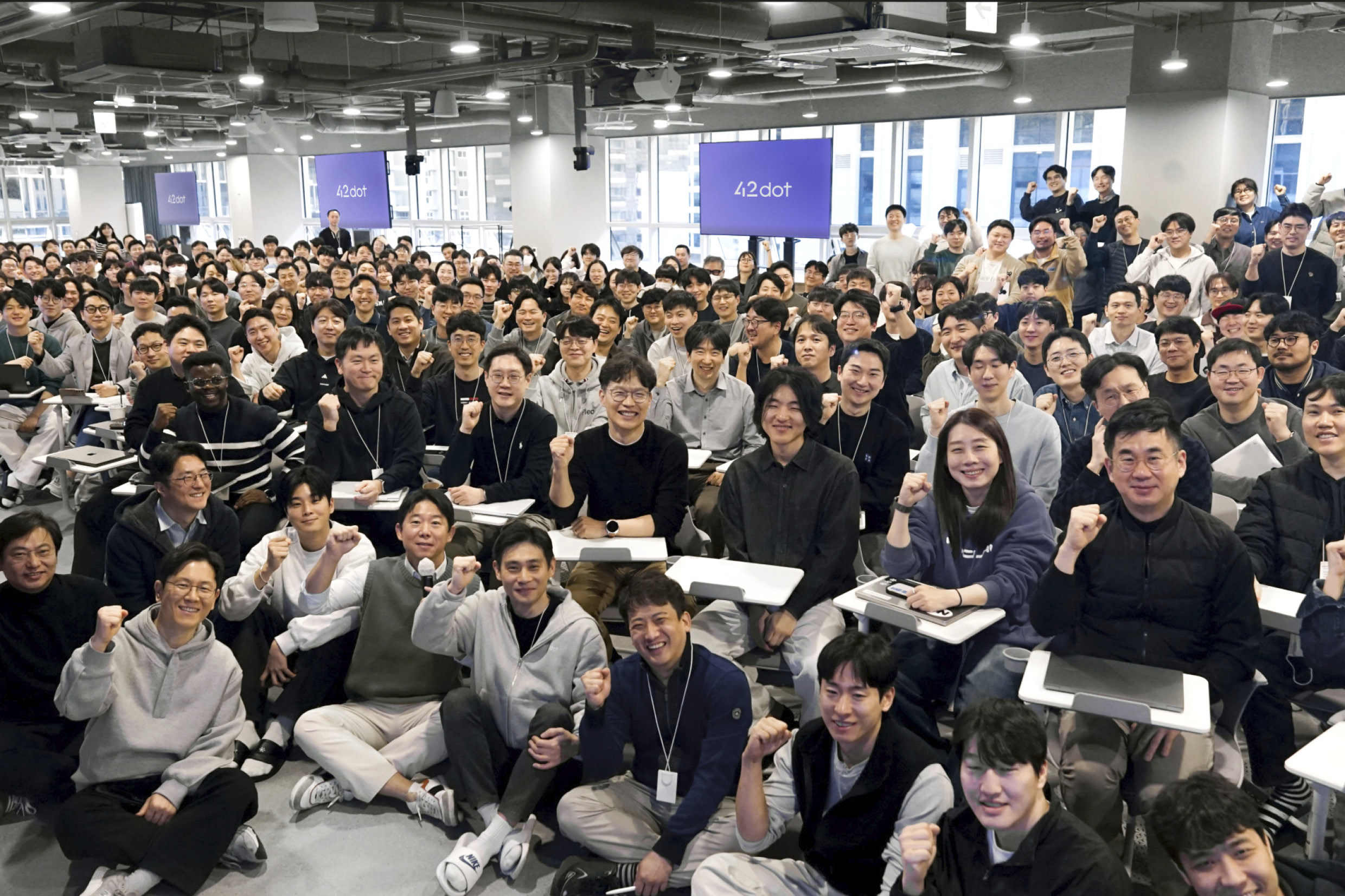 The executives and employees of Forti2Dot are gathered