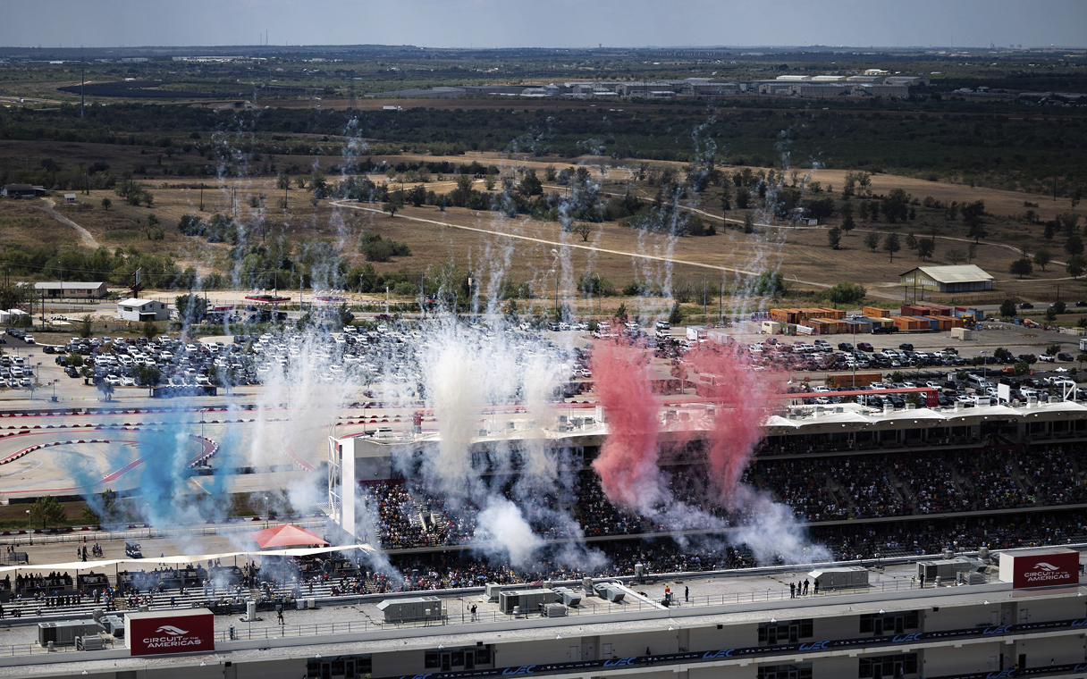fireworks are being set off to signal the start of the race