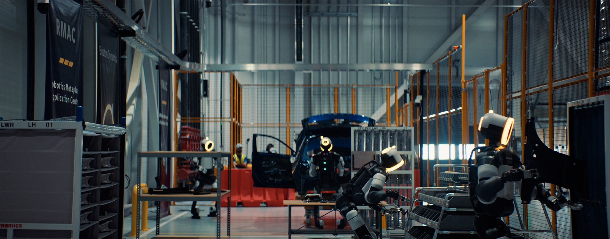 Boston Dynamics Atlas performing a task at an automotive manufacturing plant