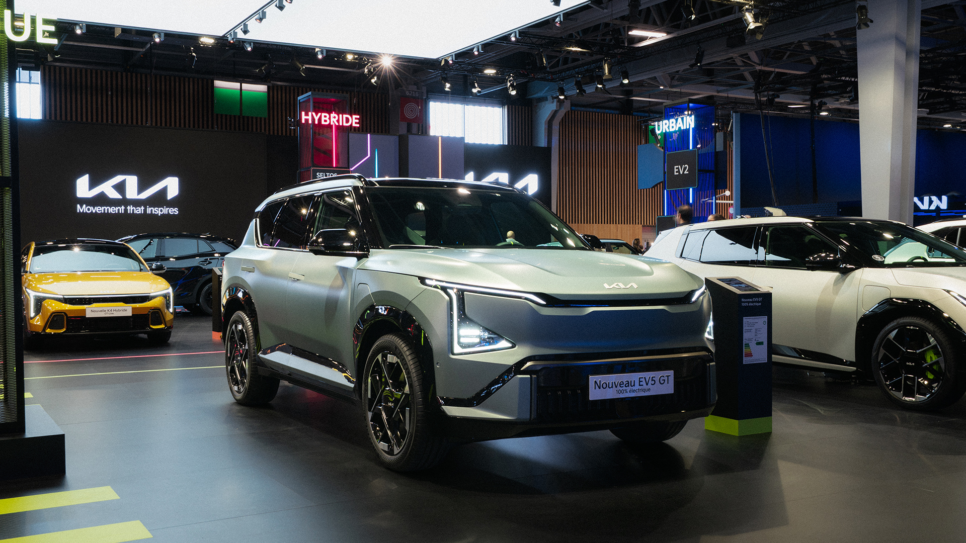 Kia EV5 vehicle displayed at the 2026 Paris Motor Show exhibition hall