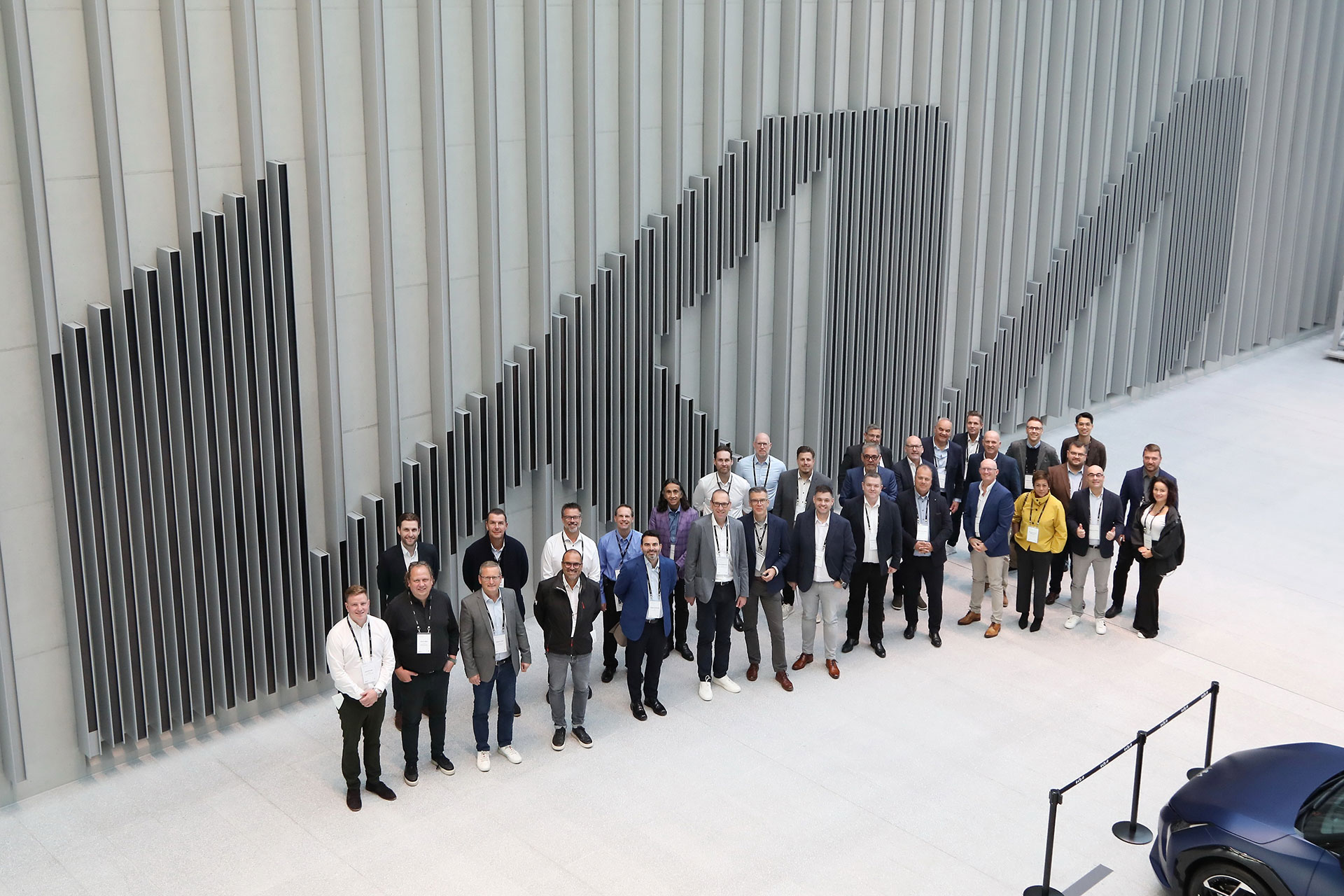 Global PBV dealers pose for a commemorative photo at Kia Vision Square after exploring Kia’s 80-year history and brand heritage.